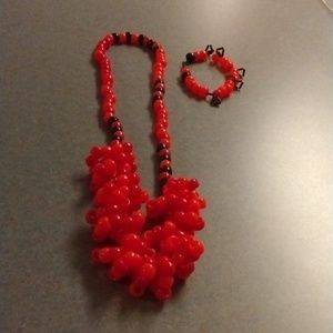 Jewelry bracelet and necklace orange and black one size fit all it stretchy
